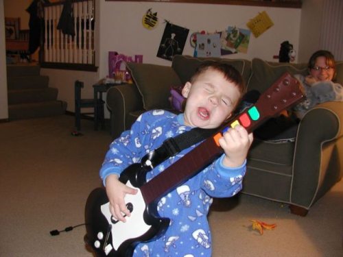toddler and guitar hero